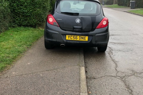 Car Parked on Pavement